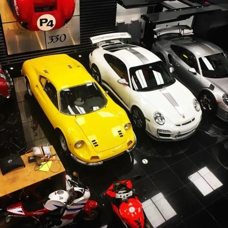 Collector cars inside a private automotive warehouse